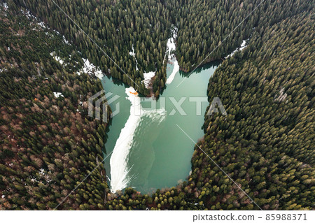 Lake Synevyr in the Carpathians of Ukraine, the lake was taken from a drone, the view of the lake from above. 85988371