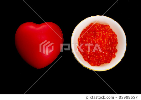 Red heart and red salmon caviar Red heart and red salmon caviar 85989657