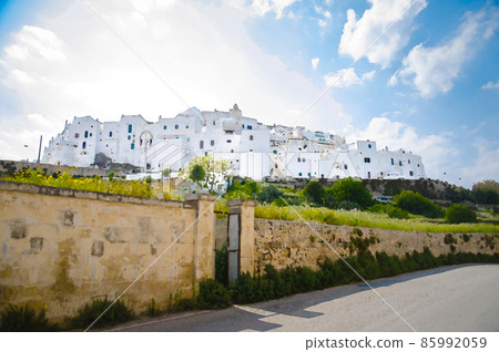 Watercolor drawing of Panoramic view of Ostuni town with white buildings in Puglia Apulia 85992059