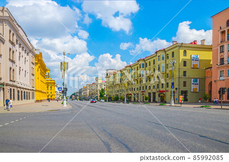 Watercolor drawing of Minsk: Independence Avenue with Socialist Classicism Stalin Empire style buildings, sidewalk pavement and riding cars Watercolor drawing of Minsk: Independence Avenue with Socialist Classicism Stalin Empire style buildings, sidewalk pavement and riding cars 85992085