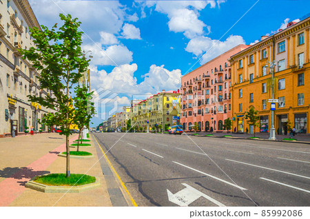 Watercolor drawing of Minsk: Independence Avenue with Socialist Classicism Stalin Empire style buildings, sidewalk pavement and riding cars Watercolor drawing of Minsk: Independence Avenue with Socialist Classicism Stalin Empire style buildings, sidewalk pavement and riding cars 85992086