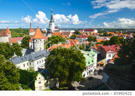 Watercolor drawing of Panoramic view of Old Town of Tallinn with traditional red tile roofs, medieval churches Watercolor drawing of Panoramic view of Old Town of Tallinn with traditional red tile roofs, medieval churches 85992422