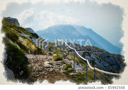 Watercolor drawing of Mountain path on the top of peak Sveti Jure in front of hills and rocks of Biokovo mountain range with cloudy sky Watercolor drawing of Mountain path on the top of peak Sveti Jure in front of hills and rocks of Biokovo mountain range with cloudy sky 85992508