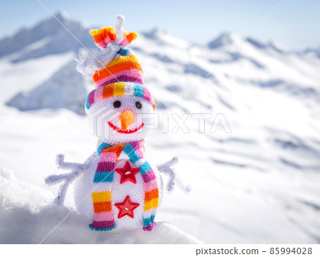 Happy snowman in mountains Happy snowman in mountains 85994028