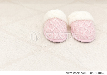 Pink cozy knitted slippers Pink cozy knitted slippers 85994062