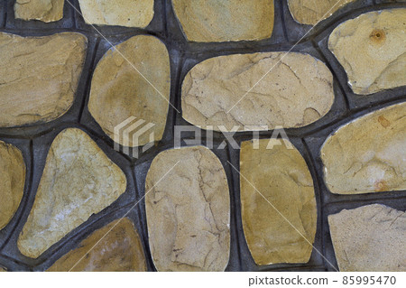Different sizes of sand stones. Stone wall pattern background Different sizes of sand stones. Stone wall pattern background 85995470
