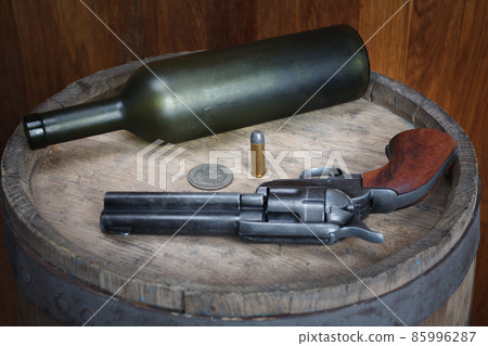 Old west revolver with cartridges 85996287