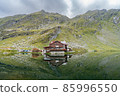 Balea chalet and Balea glacier lake near the Transfagarasan road, panoramic view. Romania 85996550