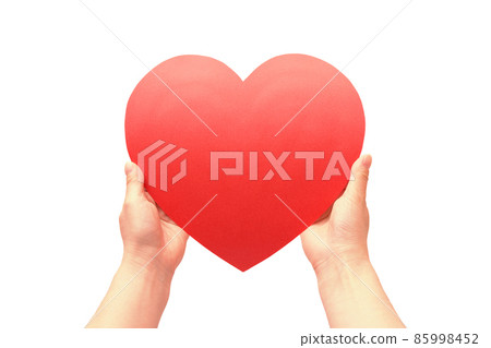Both hands of a woman with a red heart Mental health Mental care Real intention image Cutout White background White background Photo 85998452
