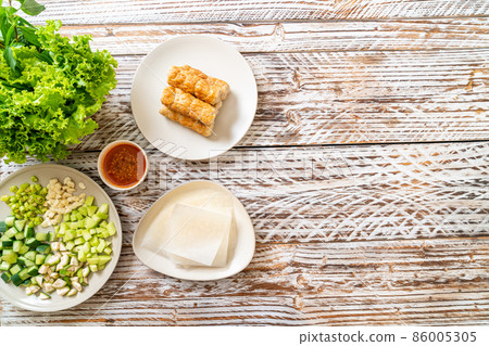Vietnamese pork  meatball with vegetables wraps (Nam-Neaung or Nham Due) 86005305
