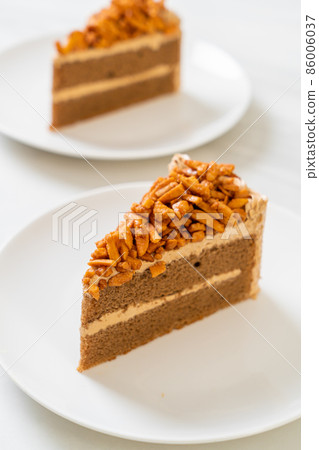 coffee almonds cake on plate 86006037