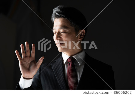 Businessman palm print biometrics Businessman palm print biometrics 86006262