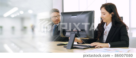 Business people wearing headset working in office broaden view Business people wearing headset working in office broaden view 86007080