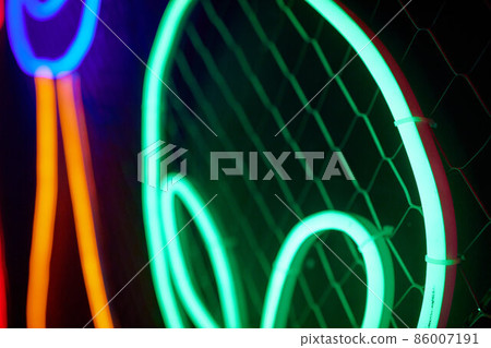 Abstact red neon sign with a blue neon tube. 86007191