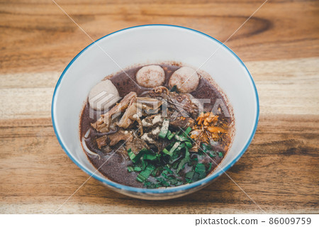 Braised beef clear noodle with meat ball soup stew Braised beef clear noodle with meat ball soup stew 86009759