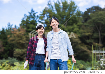 Young people doing farm work Young people doing farm work 86010512