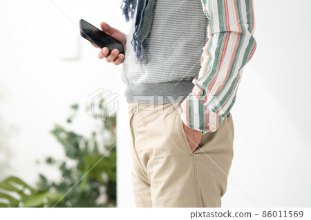 Senior male smartphone without face 86011569