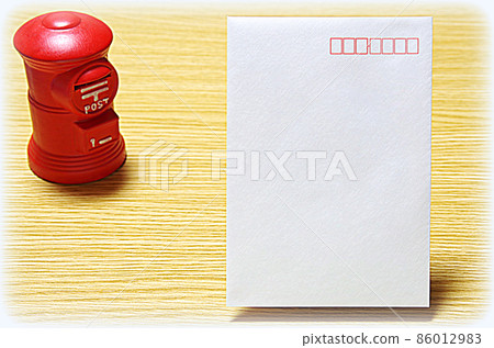 [Illustration style] Mailbox-shaped piggy bank and mail envelope (with copy space) placed on a wooden table 86012983