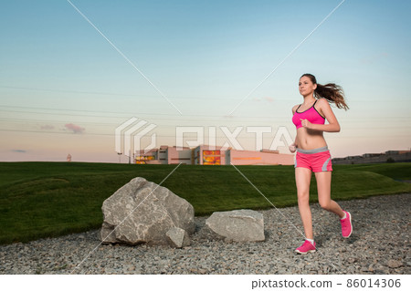 Running woman. Runner jogging in sunny nature. Running woman. Runner jogging in sunny nature. 86014306