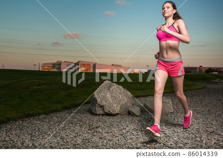 Running woman. Runner jogging in sunny nature. Running woman. Runner jogging in sunny nature. 86014339