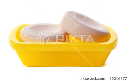 Soap on a plastic soap dish isolated on a white background Soap on a plastic soap dish isolated on a white background 86016577