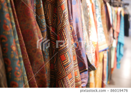 close up of many women cloths display for sale  86019476