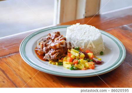 stewed pork ,pork with rice and sauce or rice with stew pork stewed pork ,pork with rice and sauce or rice with stew pork 86020595