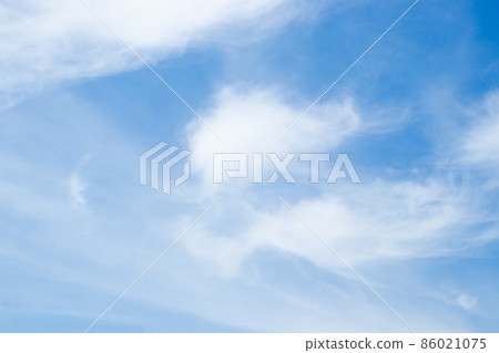 Clear blue color sky with white cloud background Clear blue color sky with white cloud background 86021075