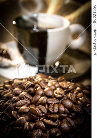 coffee cup and coffee beans on canvas 86021556