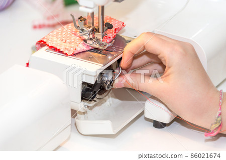 using sewing machine 86021674