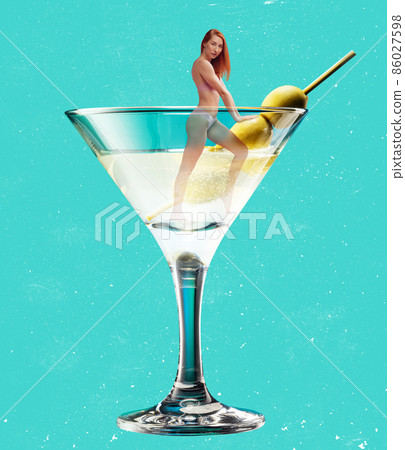 Young slim girl into martini cocktail glass isolated on blue background. Contemporary art collage, modern design. Nightclub, party mood. Surrealism 86027598
