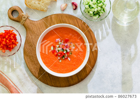 Traditional spanish cold tomato soup of fresh raw vegetables 86027673