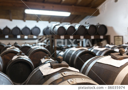 balsamic vinegar wooden barrels storing and aging 86035974