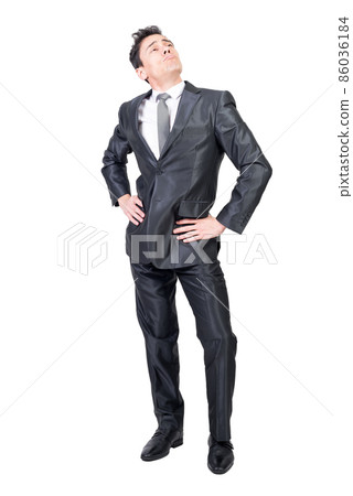 Arrogant man in formal suit. White background. Arrogant man in formal suit. White background. 86036184