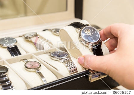 Collection of ladies wrist watches in storage box 86036197