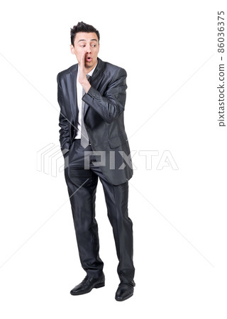 Businessman telling secret in studio. White background. 86036375