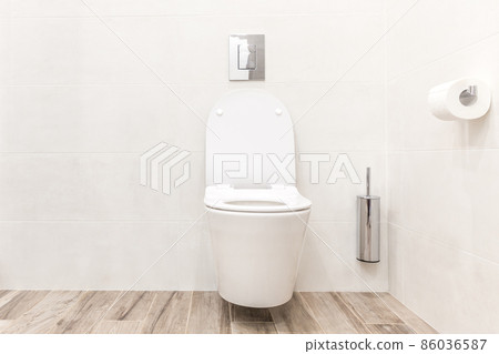Toilet bowl in modern white style bathroom Toilet bowl in modern white style bathroom 86036587