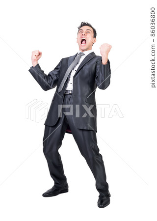 Excited businessman celebrating success and screaming in studio Excited businessman celebrating success and screaming in studio 86036800