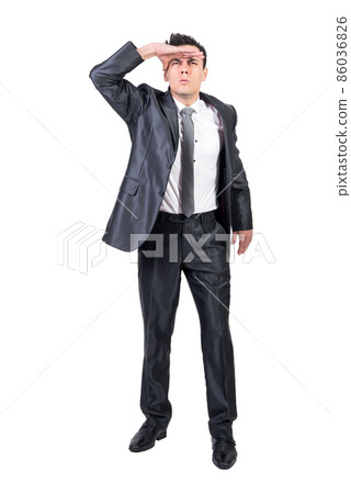 Focused man looking away in studio. White background. 86036826