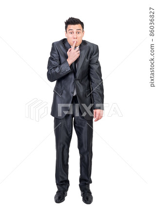 Hiding man in elegant suit. White background. 86036827