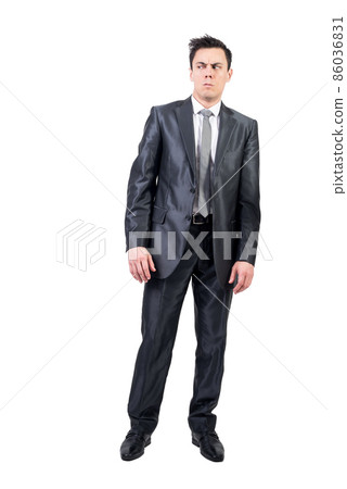 Suspicious man in formal suit. White background. 86036831