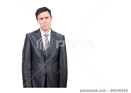 Sad man in elegant suit looking at camera Sad man in elegant suit looking at camera 86036920