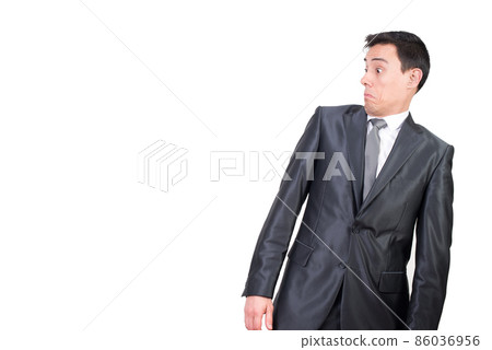 Amazed man in formal wear in studio 86036956