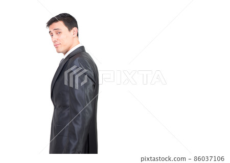Seductive man in formal suit looking at camera Seductive man in formal suit looking at camera 86037106