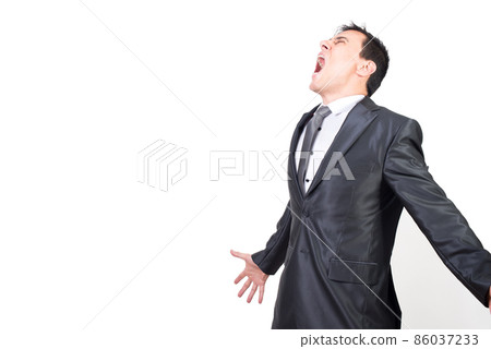 Man in suit outstretching arms and screaming loud Man in suit outstretching arms and screaming loud 86037233