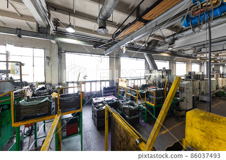 Photo of modern automatic automobile manufacturing workshop. Factory with steel constructions. Plant Photo of modern automatic automobile manufacturing workshop. Factory with steel constructions. Plant 86037493