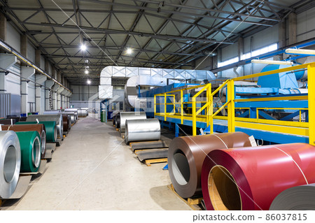 Photo shot of roll of painted galvanized steel sheet at cutting machine, ironworks and metalwork in 86037815