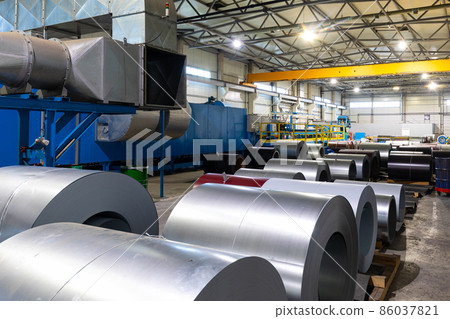 Photo of steel roofing forming machine. Industrial machine for metal sheet roof coils cut. Factory Photo of steel roofing forming machine. Industrial machine for metal sheet roof coils cut. Factory 86037821