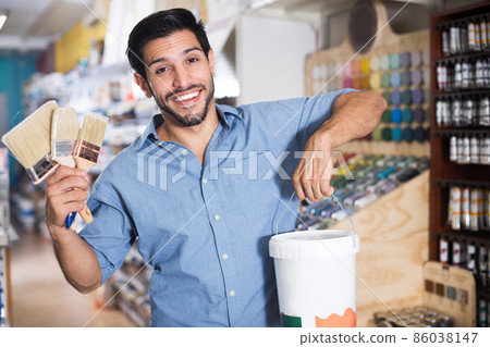 Male buyer in paint store Male buyer in paint store 86038147
