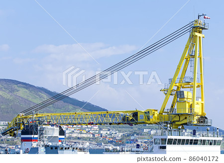 vessel with a crane at the port in Kamchatka Peninsula 86040172